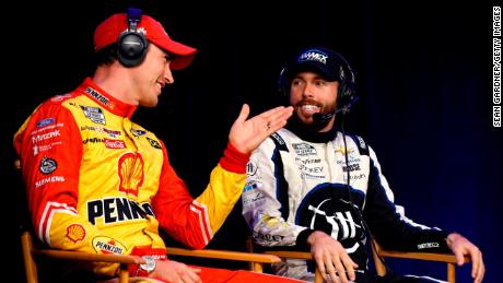 Joey Logano (left) and Ross Chastain talk during a roundtable discussion at the NASCAR Championship 4 Media Day at Phoenix Raceway on November 03, 2022 in Avondale, Arizona.