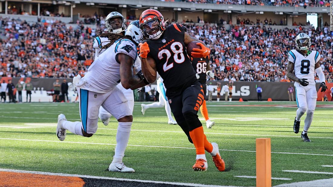 Joe Mixon scores a touchdown for the Cincinnati Bengals during the third quarter against the Carolina Panthers. Mixon scored five TDs in the 42-21 win over the Panthers, breaking the Bengals&#39; record for the most touchdowns in a single game.