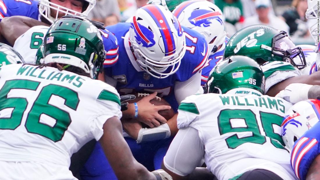 Buffalo Bills quarterback Josh Allen scores a first quarter touchdown against the New York Jets, but the Bills&#39; fast start wasn&#39;t enough though, as the Jets fought back and were able to record a huge victory over their high-flying division rivals, 20-17. 