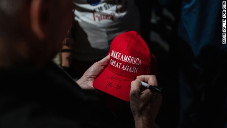 McCarthy signs a &quot;Make America Great Again&quot; hat after an event featuring south Texas Republican congressional candidates in McAllen on Sunday.
