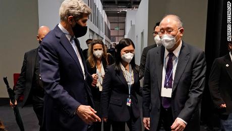 China&#39;s chief climate negotiator Xie Zhenhua, right, walks with John Kerry, US Special Presidential Envoy for Climate, at last year&#39;s UN climate summit in Glasgow, Scotland.