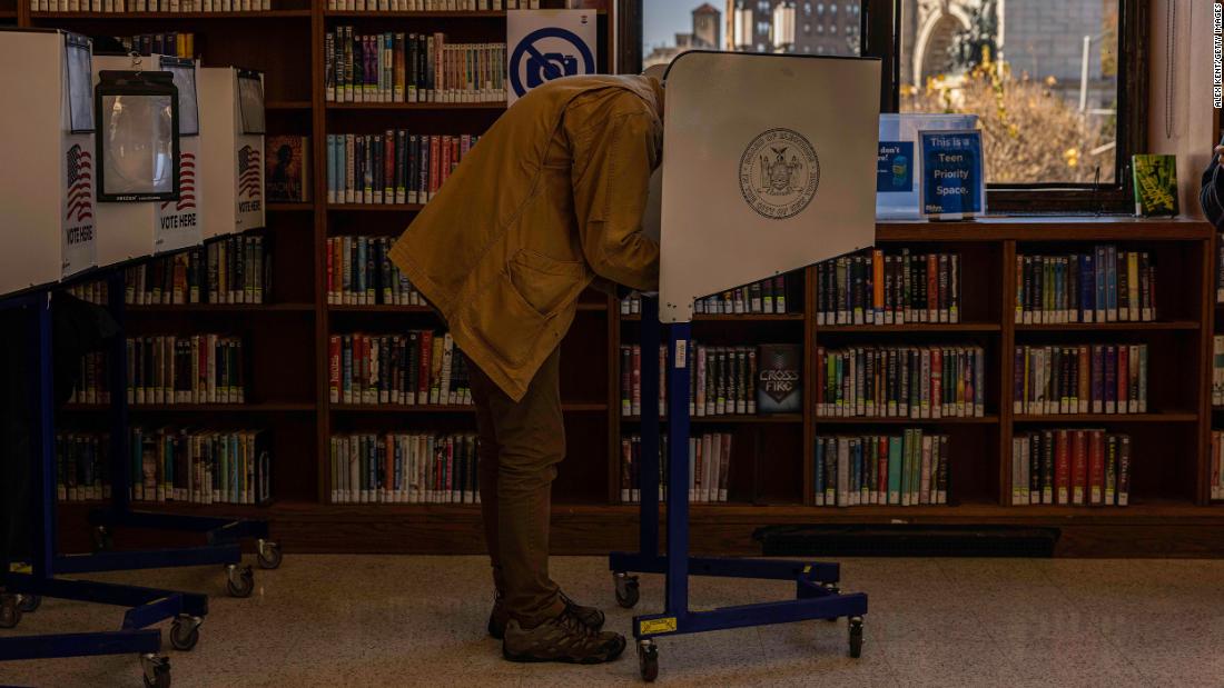 Voters cast their ballots at the Brooklyn Public Library in New York.