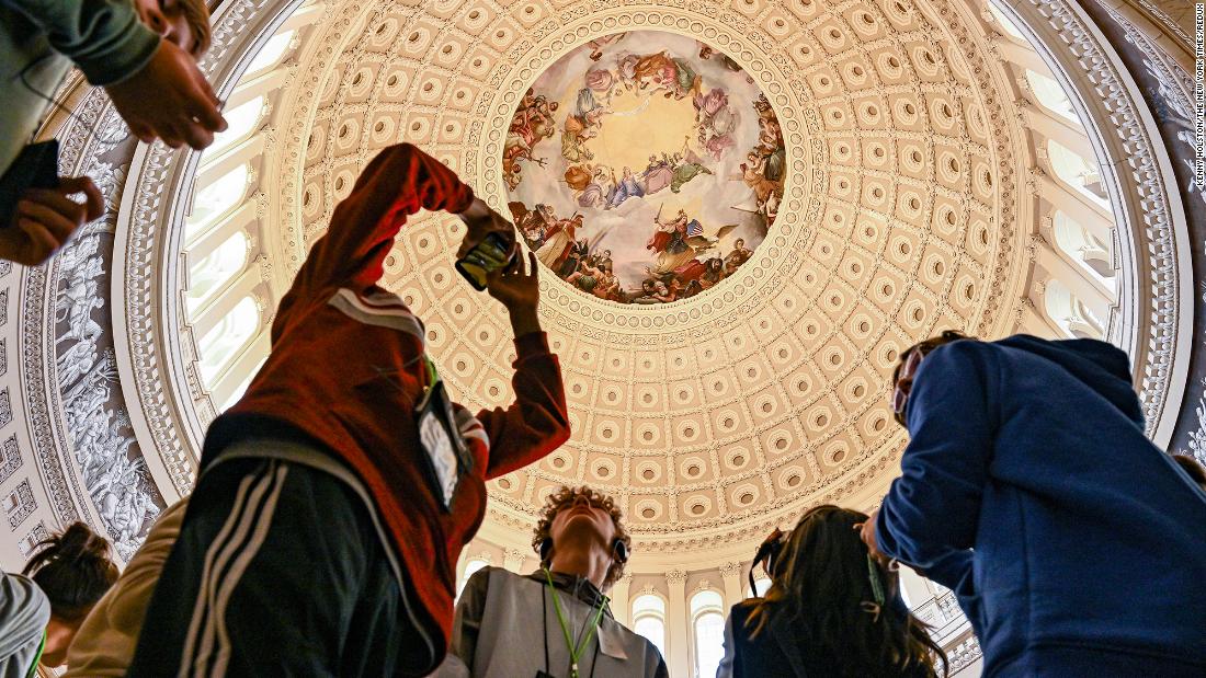 Visitors take photos inside the US Capitol Rotunda on Election Day.