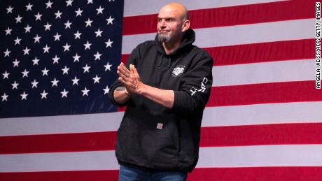 Pennsylvania Democratic Senatorial candidate John Fetterman gestures onstage at a watch party during the midterm elections at Stage AE in Pittsburgh, Pennsylvania, on November 8, 2022. - President Joe Biden&#39;s party picked up a first seat in the upper chamber of Congress on Tuesday as Democrat John Fetterman defeated celebrity doctor Mehmet Oz in Pennsylvania, media projections showed. (Photo by ANGELA WEISS / AFP) (Photo by ANGELA WEISS/AFP via Getty Images)