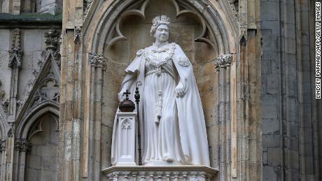 The statue of Queen Elizabeth II sits on the west front of York Minster in northern England.