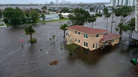 DAYTONA BEACH, FLORIDA - NOVEMBER 10: In this aerial view, flood water surround a building after Hurricane Nicole came ashore on November10, 2022 in Daytona Beach, Florida.  Nicole came ashore as a Category 1 hurricane before hitting Florida&#39;s east coast. (Photo by Joe Raedle/Getty Images)