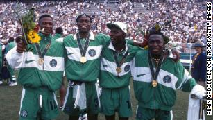 Abiodon Obafemi, Taribo West, Mobi Oparaku and Wilson Oruma sporting their newly won Olympic gold medals after the final against Argentina.