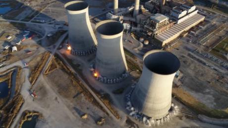 Massive towers imploded at defunct coal plant in Kentucky