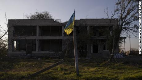 A view of the Ukrainian flag in front of a damaged settlement in Potemkin village which is recently retaken from Russian Forces, Kherson Oblast, Kherson, Ukraine on November 10, 2022. 