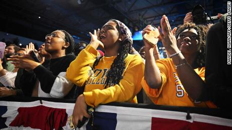 Attendees cheer during a rally for Democrats at Bowie State University in Bowie, Maryland, on November 7, 2022.