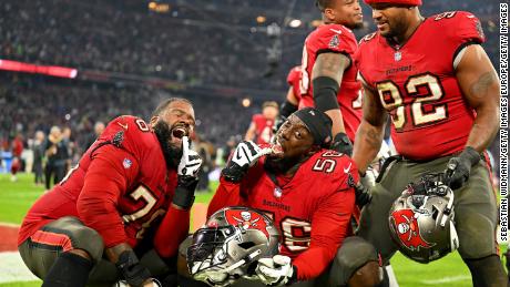 Bucs&#39; Donovan Smith, Rakeem Nunez-Roches and William Gholston celebrate after beating the Seahawks.
