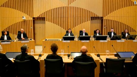Presiding judge Hendrik Steenhuis, fourth from right, speaks during the verdict session of MH17 trial at Schiphol airport, near Amsterdam, Netherlands, November 17, 2022.