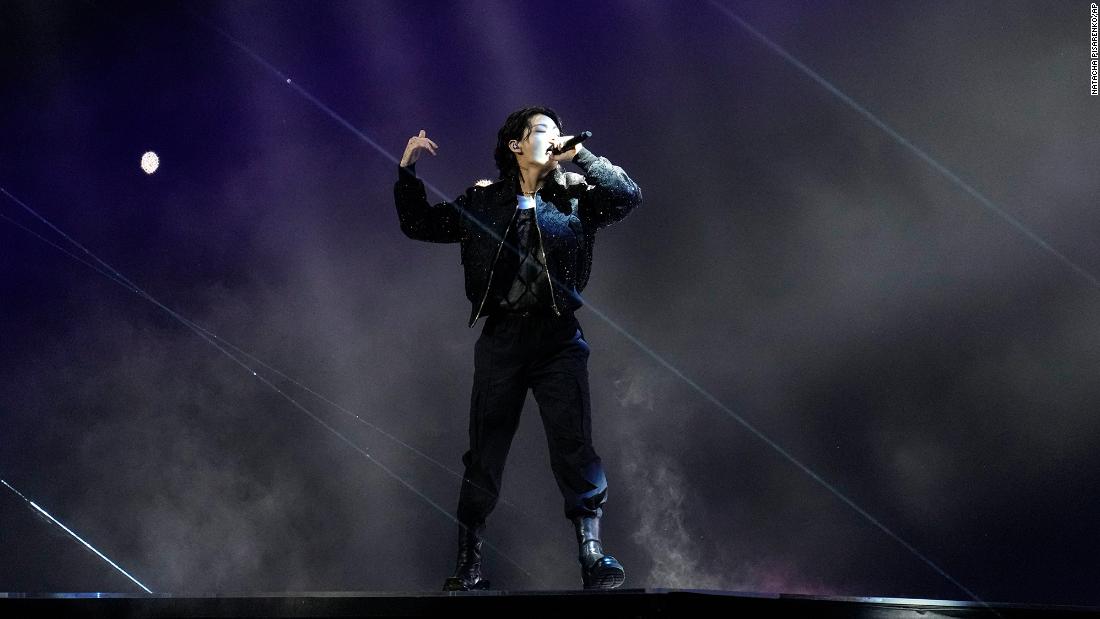 South Korean singer Jung Kook performs at the opening ceremony.