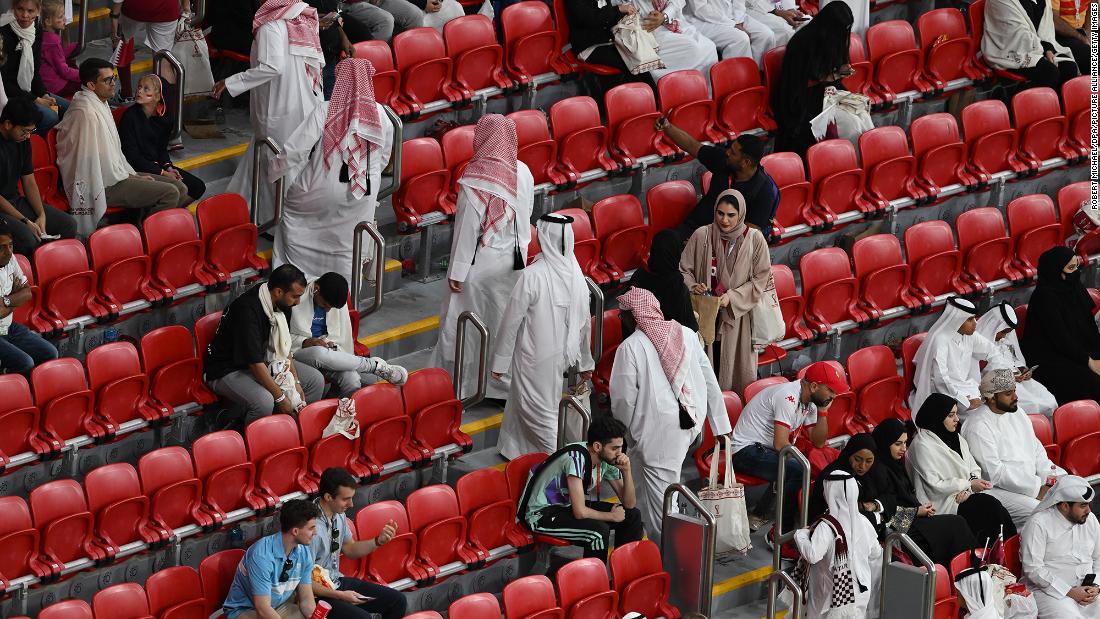 Spectators leave Al Bayt Stadium before the end of the Qatar-Ecuador match. No host country had lost a World Cup opener before.