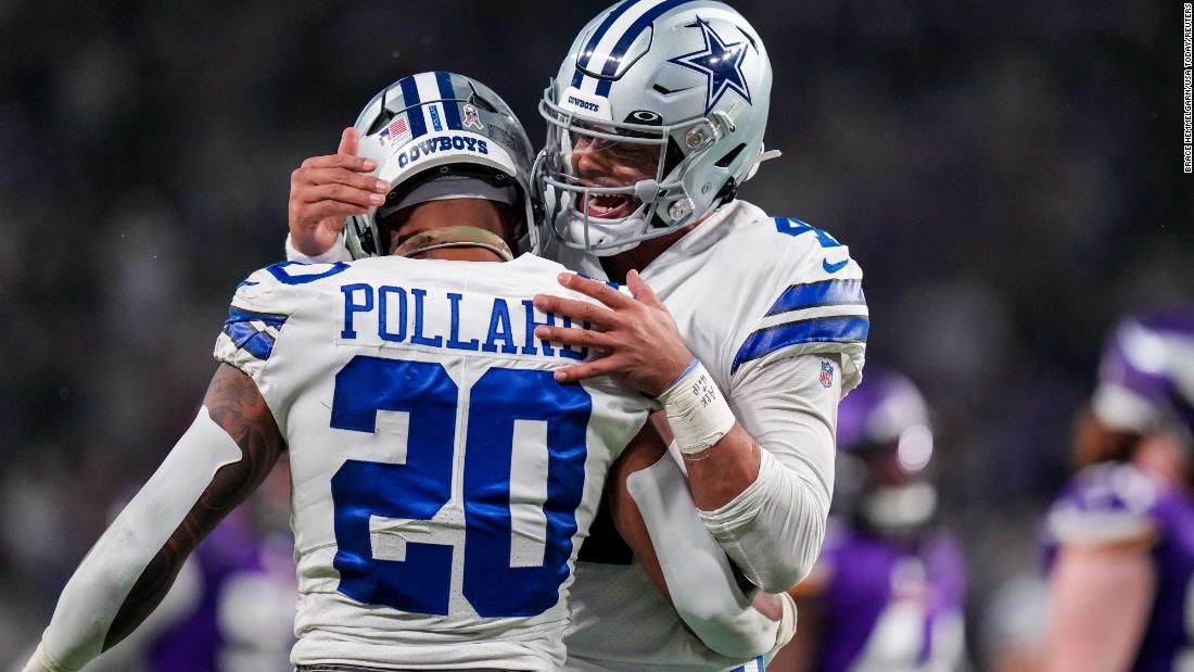 Dallas Cowboys quarterback Dak Prescott celebrates a touchdown with running back Tony Pollard in the third quarter against the Minnesota Vikings at US Bank Stadium. The Cowboys (7-3) demolished the previously Vikings (8-2) 40-3 on the road in an astonishing performance.