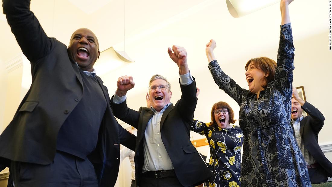 Labour Party leader Keir Starmer, center, celebrates England&#39;s second goal with colleagues David Lammy, left, and Lucy Powell, right, in his parliamentary office at the Palace of Westminster in London.