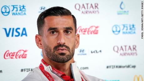 Iran defender Ehsan Hajsafi attends a press conference at the Qatar National Convention Center (QNCC) in Doha.