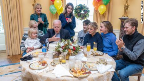 President Joe Biden celebrates his 80th birthday, blowing out the candle on his coconut birthday cake with first lady Jill Biden, Naomi Biden, her husband Peter Neal and other Biden grandchildren on Sunday, November 20, 2022.