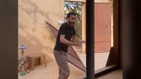 See hilarious moment a Saudi soccer fan tears a door from frame during surprise upset