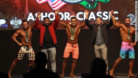 Participants take part in Libya&#39;s Ashoor Classic bodybuilding championship in the capital Tripoli, Libya on Tuesday. 