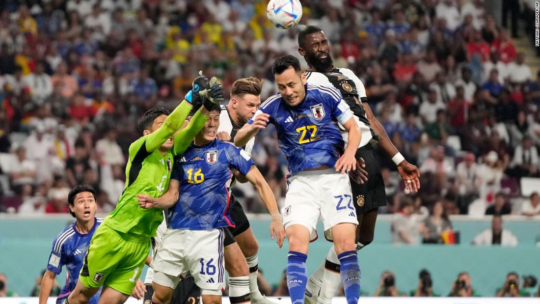 Germany&#39;s Antonio Rüdiger, top right, is first to a header during the match against Japan.