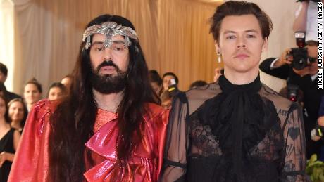 Singer/songwriter Harry Styles (R) and Gucci creative director Alessandro Michele (L) arrive for the 2019 Met Gala at the Metropolitan Museum of Art on May 6, 2019, in New York. - The Gala raises money for the Metropolitan Museum of Arts Costume Institute. The Gala&#39;s 2019 theme is Camp: Notes on Fashion&quot; inspired by Susan Sontag&#39;s 1964 essay &quot;Notes on Camp&quot;. (Photo by ANGELA WEISS / AFP)        (Photo credit should read ANGELA WEISS/AFP via Getty Images)