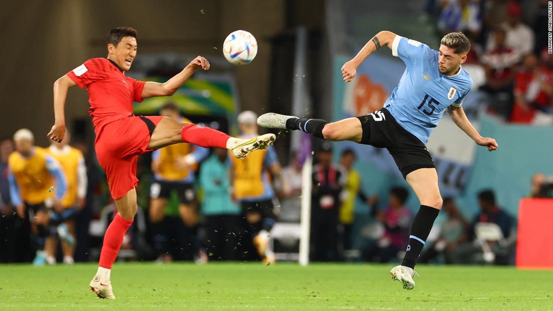 South Korea&#39;s Jung Woo-young competes for a ball with Uruguay&#39;s Federico Valverde on November 24. Their match ended 0-0.