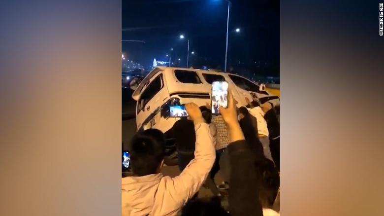 Protesters overturn car amid violent clashes at world's largest iPhone factory