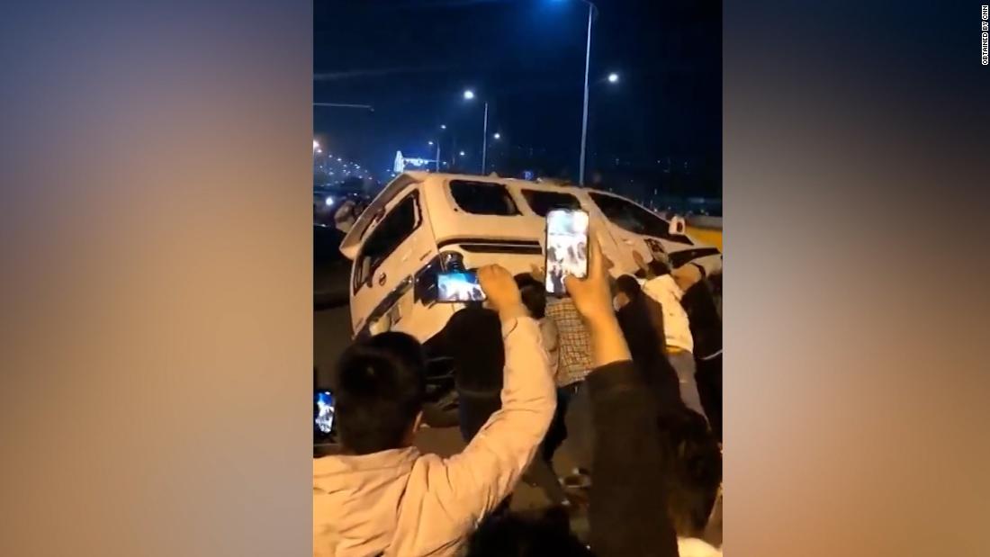 Protesters flip car amid violent clashes at iPhone factory
