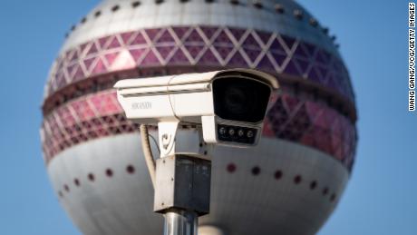 A Hikvision camera seen in front of the Oriental Pearl Radio &amp; Television Tower at Lujiazui Financial Centre on Dec. 2, 2021 in Shanghai.