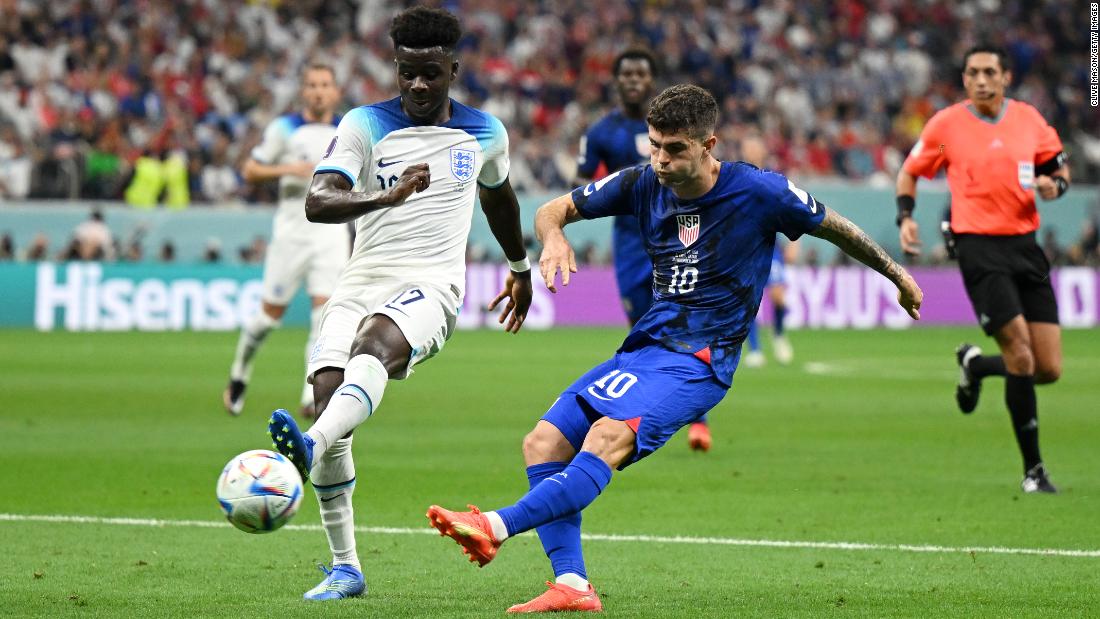 US star Christian Pulisic takes a shot against England in the first half of their World Cup match on November 25. The shot  smacked off the crossbar, and the game would eventually end 0-0.