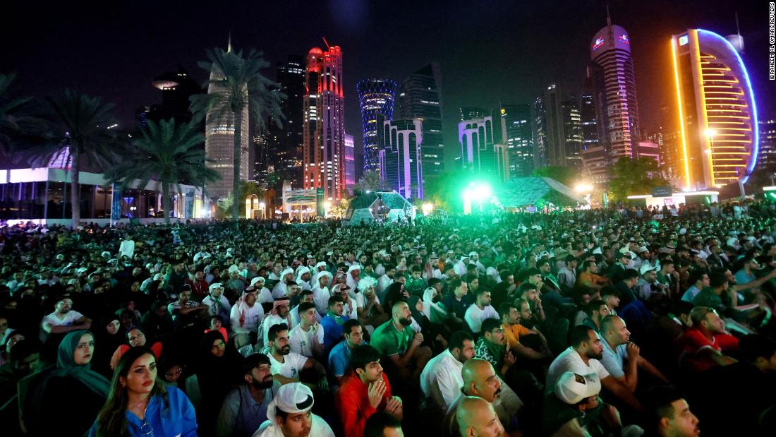 Fans in Doha, Qatar, watch the match between Poland and Saudi Arabia on November 26. 