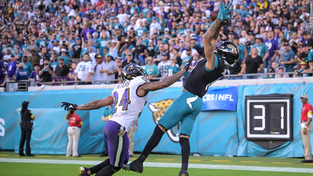 Jacksonville Jaguars wide receiver Marvin Jones Jr. makes the game-winning touchdown catch with 18 seconds left against Baltimore Ravens cornerback Marcus Peters during the second half of their game in Week 12.