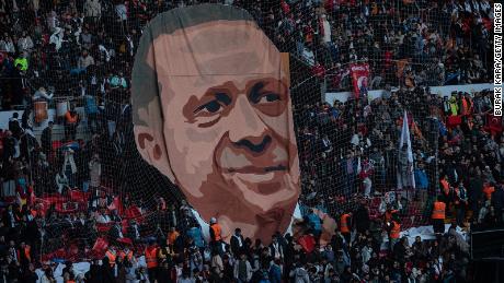 A giant poster of Turkey&#39;s President Recep Tayyip Erdogan is put on display at a stadium rally on Sunday in Istanbul. In next June&#39;s general election, the Turkish president is looking for another term in the office he has occupied since 2014.  