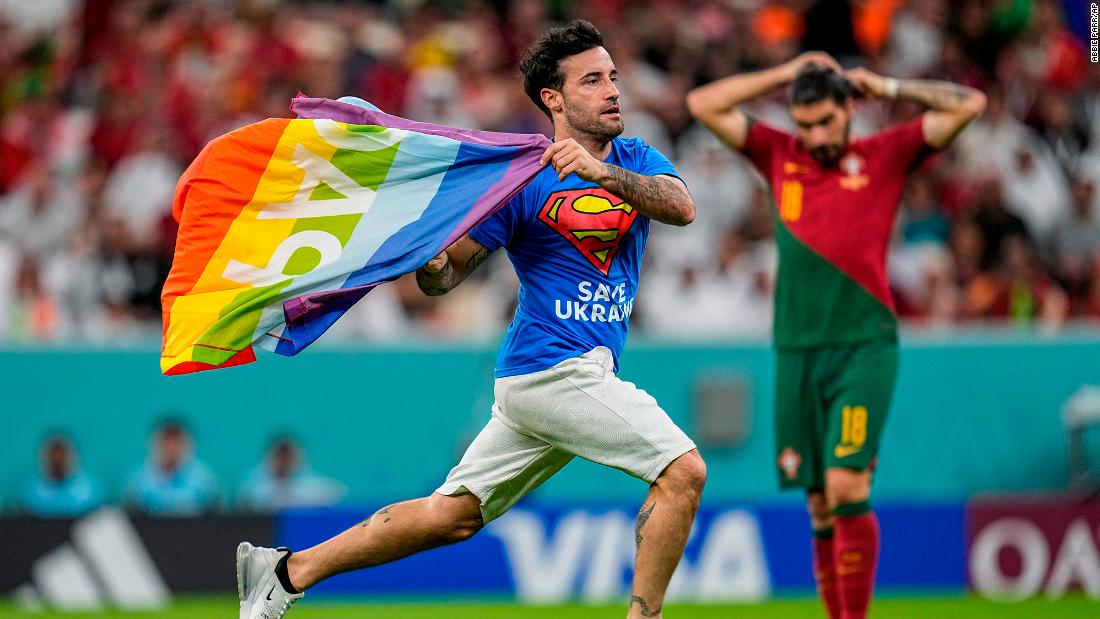 A man &lt;a href=&quot;https://www.cnn.com/2022/11/28/football/pitch-invader-rainbow-flag-2022-world-cup-spt-intl/index.html&quot; target=&quot;_blank&quot;&gt;runs onto the field with a rainbow flag&lt;/a&gt; during the match between Portugal and Uruguay. The man, an Italian named Mario Ferri, was also wearing a shirt that said &quot;save Ukraine&quot; on the front and &quot;respect for Iranian women&quot; on the back. In a series of posts of his Instagram story, Ferri called himself the &quot;new Robin Hood&quot; and said, &quot;Breaking the rules if you do it for a good cause is NEVER A CRIME.&quot; He was banned from attending future matches.