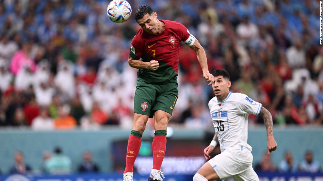Portugal forward Cristiano Ronaldo tries to head the ball toward goal in the second half of the Uruguay match. He appeared at first to nod in the first goal, but after review it was determined that he didn&#39;t touch it and Bruno was credited with the goal.