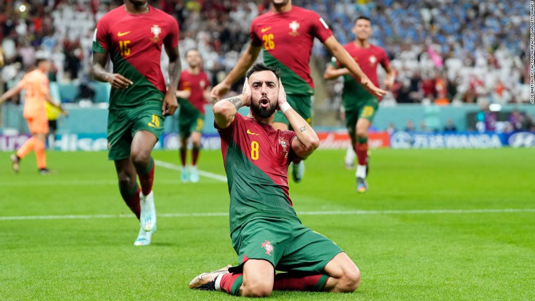 Portugal&#39;s Bruno Fernandes celebrates after scoring his second goal in the 2-0 victory over Uruguay on November 28. The win clinched Portugal&#39;s spot in the knockout stage.