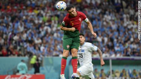 Cristiano Ronaldo attempts to head the ball home against Uruguay.