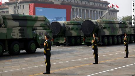 Chinese military vehicles carrying DF-41 ballistic missiles roll past the Great Hall of the People during a parade to commemorate the 70th anniversary of the founding of Communist China in Beijing, October 1, 2019. 