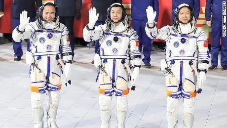 (From left) Chinese astronauts Zhang Lu, Deng Qingming and Fei Junlong attend a prelaunch ceremony at the Jiuquan Satellite Launch Center on November 29.