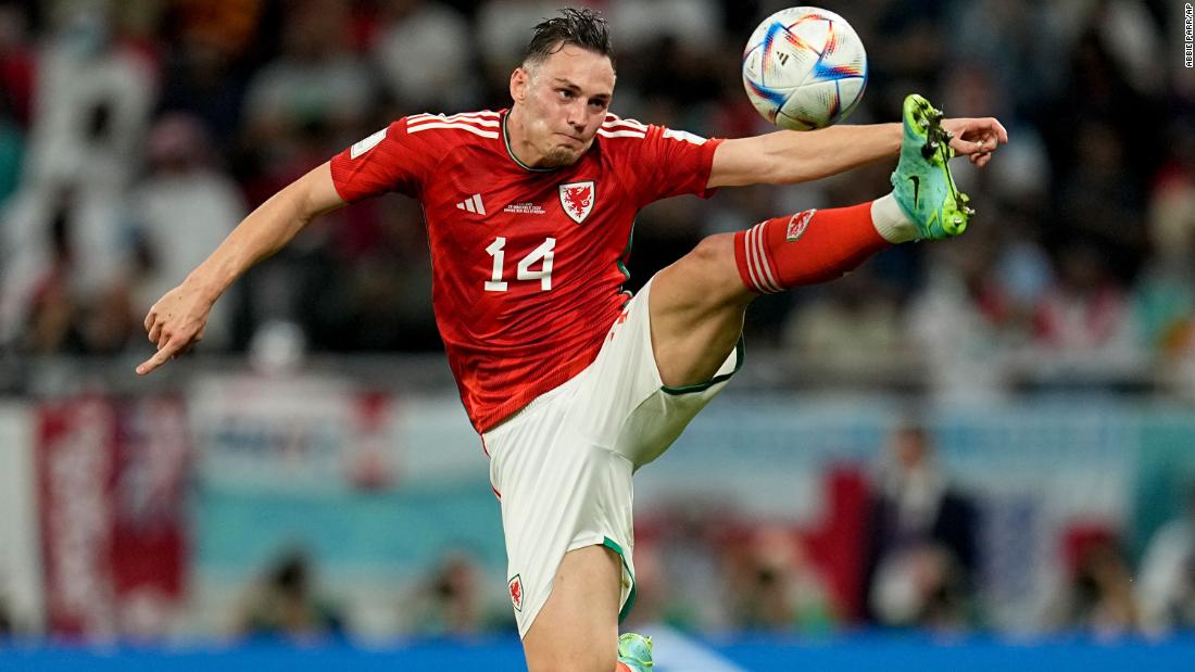 Wales&#39; Connor Roberts stretches for a ball during the match against England.
