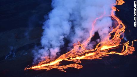 Aerial photograph taken during an overflight of the Northeast Rift Zone eruption of Mauna Loa at approximately 5-6:30 p.m. HST on November 28, 2022. Fissure vents above 10,000 ft on the Northeast Rift Zone generate lava fountains and lava flows to the northeast and parallel to the rift zone. Image courtesy of Civil Air Patrol.