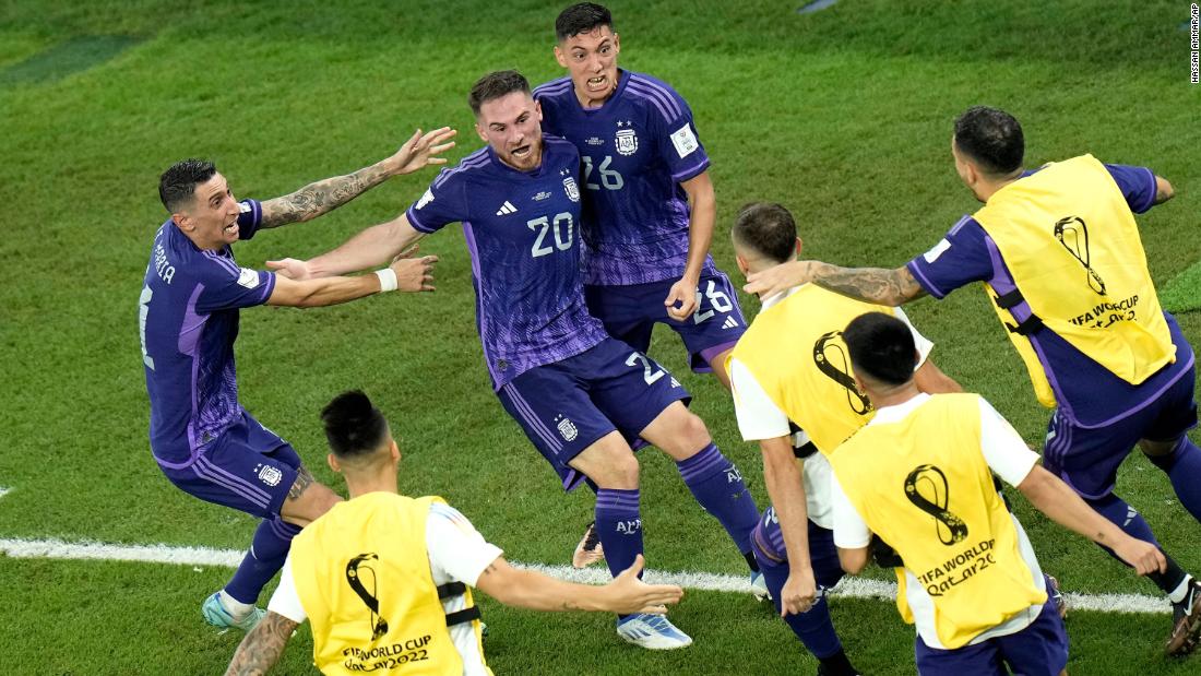 Lionel Messi has penalty saved but Argentina progresses to World Cup knockouts with win