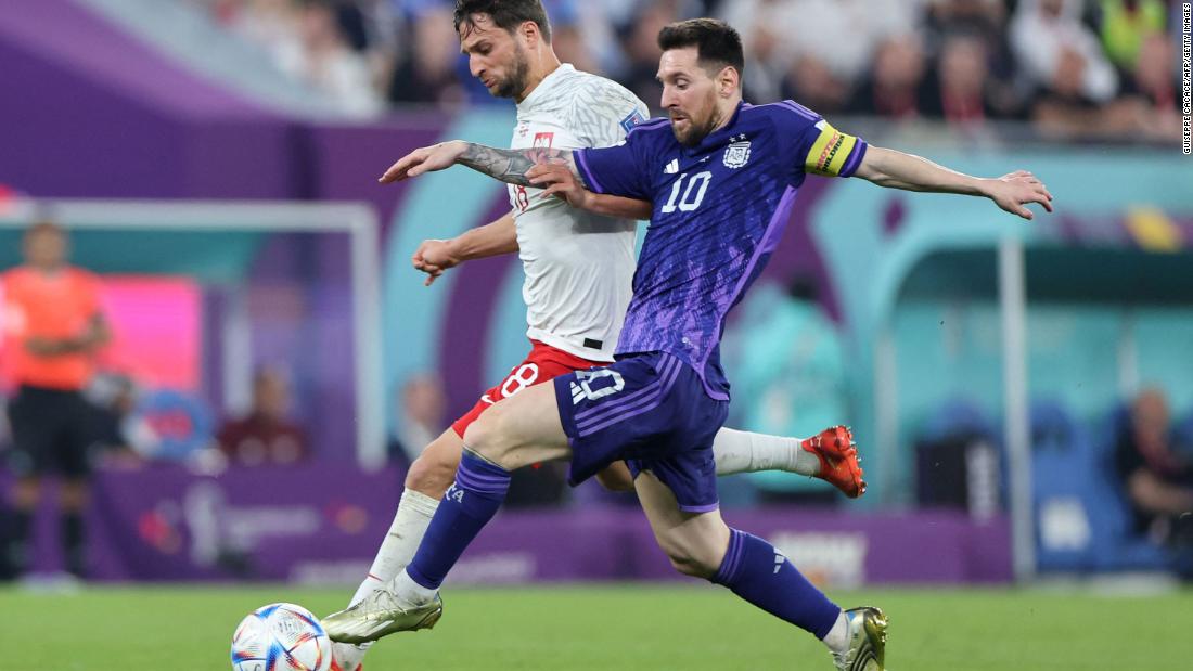 Messi and Poland&#39;s Bartosz Bereszynski compete for the ball.