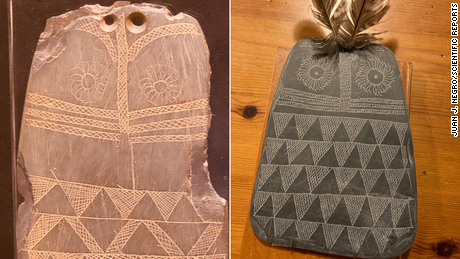 Original slate plaque modelled after an owl in the Museo de Huelva. Replica of the Valencina Slate Plaque with inserted owl feathers on the two drilled holes at the top of the plaque. 
