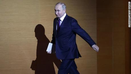 Russian President Vladimir Putin enters the hall during the plenary session of the 10th All-Russia&#39;s Congress of Judges at the State Kremlin Palace, November,29,2022, in Moscow, Russia. 