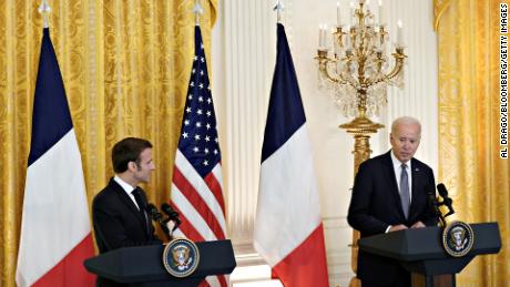 US President Joe Biden speaks as Emmanuel Macron, France's president, left, listens at a news conference in the East Room of the White House during a state visit in Washington, DC, US, on Thursday, Dec. 1, 2022. Biden is welcoming Macron for the first White House state dinner in more than three years, setting aside recent tensions with Paris over defense and trade issues to celebrate the oldest US alliance. 