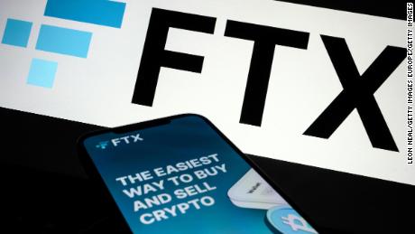LONDON, ENGLAND - NOVEMBER 10: In this photo illustration the FTX logo and mobile app adverts are displayed on screens on November 10, 2022 in London, England. The Bahamas-based crypto exchange&#39;s larger rival, Binance, walked away from a potential bailout deal, as FTX struggles with a wave of customer withdrawals that have created a liquidity crunch. (Photo Illustration by Leon Neal/Getty Images)