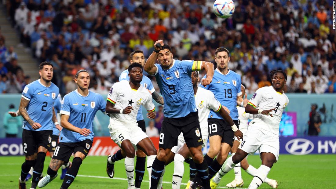 Uruguay&#39;s Luis Suarez, foreground, looks to head the ball against Ghana.