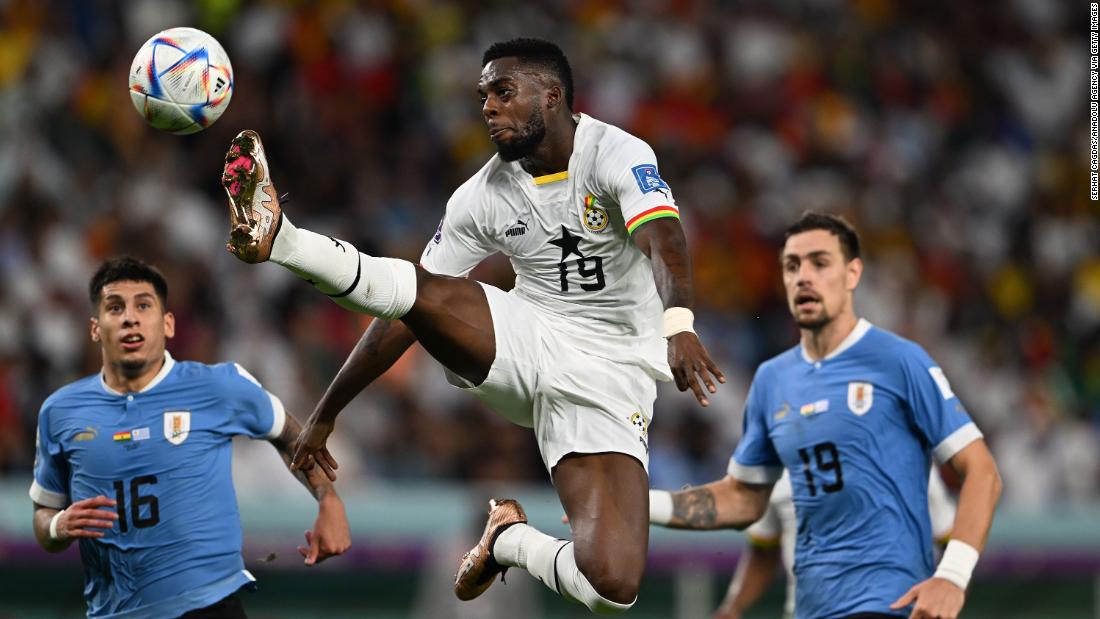 Ghana&#39;s Inaki Williams leaps for a kick against Uruguay.